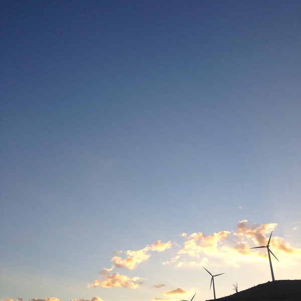 Sunshine and wind turbines img